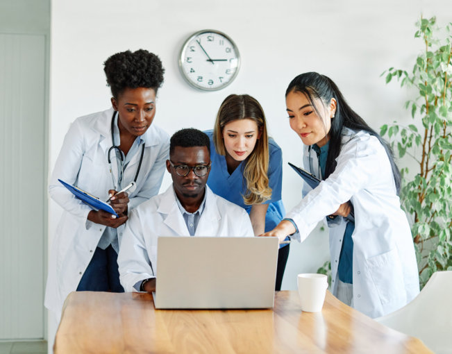 nursing students looking at the laptop