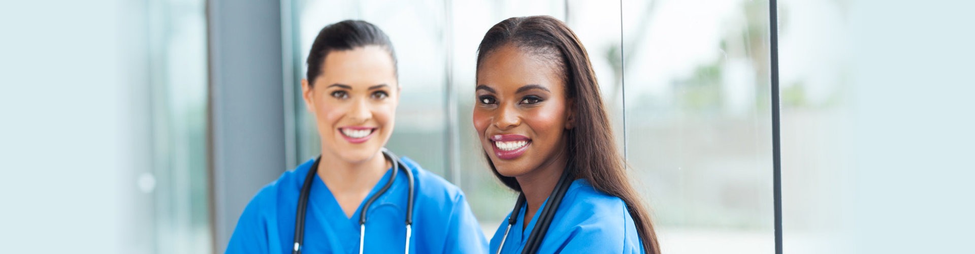 two female nurses sitting